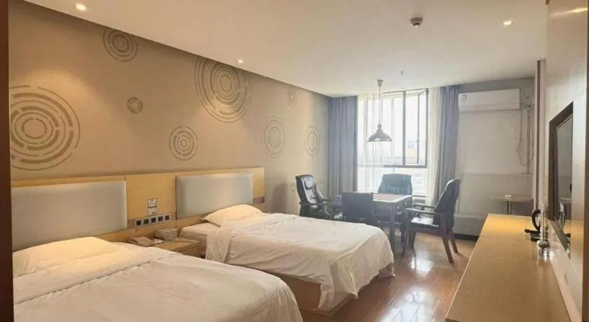 Bed in GreenTree Inn Huanggang City Wuxue City Kanjiang Avenue