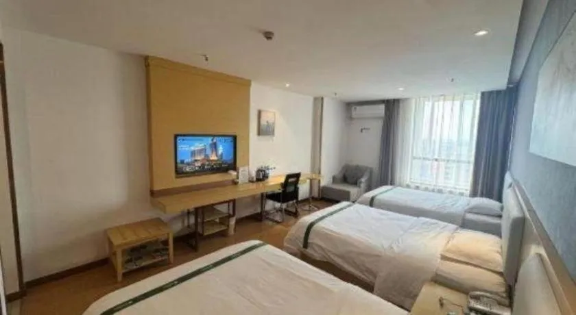 Bed in GreenTree Inn Huanggang City Wuxue City Kanjiang Avenue