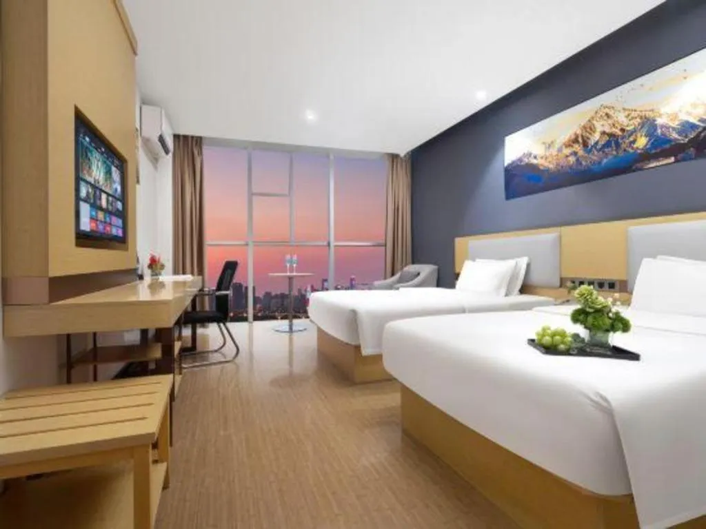 Bed in GreenTree Inn Huanggang City Wuxue City Kanjiang Avenue