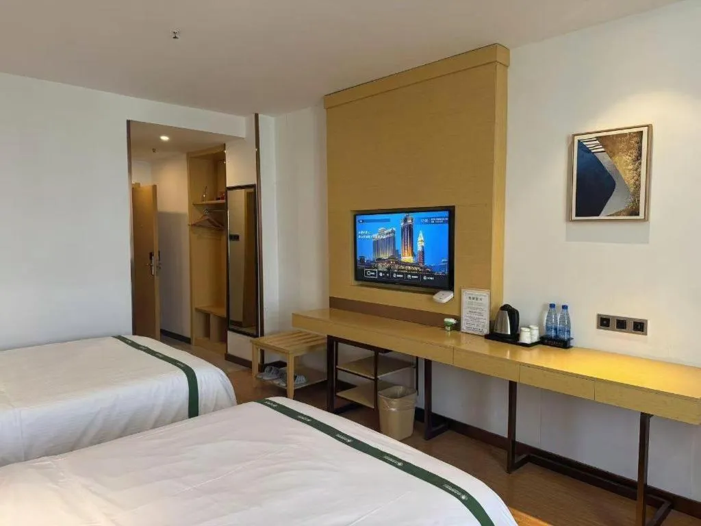 Bed in GreenTree Inn Huanggang City Wuxue City Kanjiang Avenue