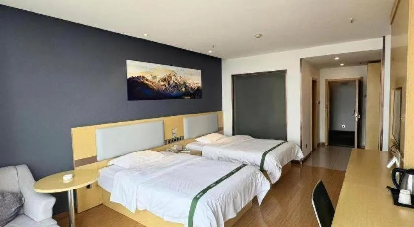 Bed in GreenTree Inn Huanggang City Wuxue City Kanjiang Avenue