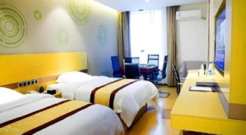 Bed in GreenTree Inn Huanggang City Wuxue City Kanjiang Avenue