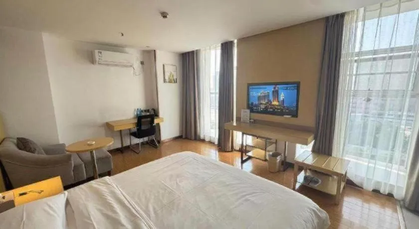 Bed in GreenTree Inn Huanggang City Wuxue City Kanjiang Avenue