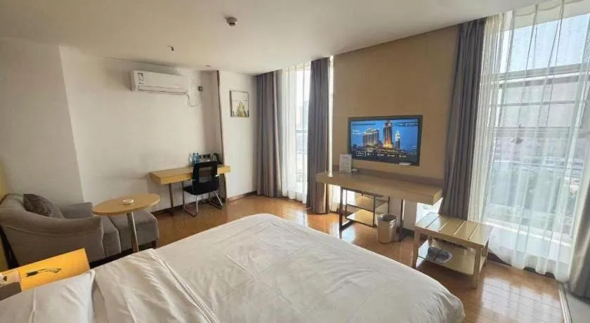 Bed in GreenTree Inn Huanggang City Wuxue City Kanjiang Avenue