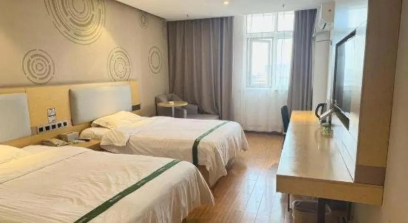 Bed in GreenTree Inn Huanggang City Wuxue City Kanjiang Avenue