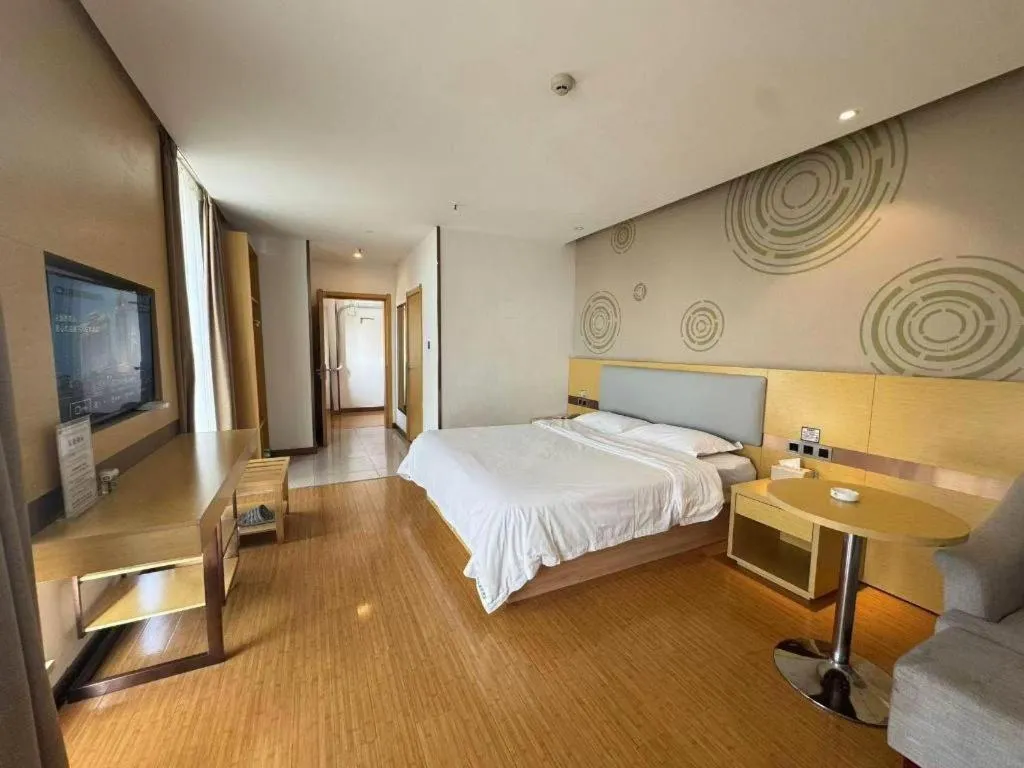 Bed in GreenTree Inn Huanggang City Wuxue City Kanjiang Avenue