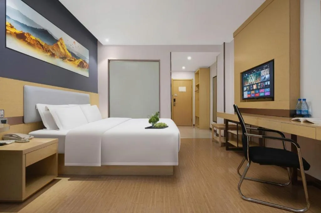 Bed in GreenTree Inn Huanggang City Wuxue City Kanjiang Avenue