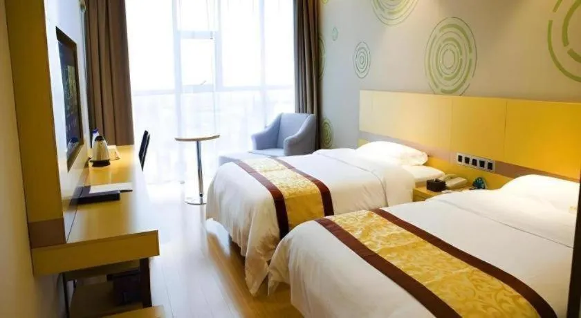 Bed in GreenTree Inn Huanggang City Wuxue City Kanjiang Avenue