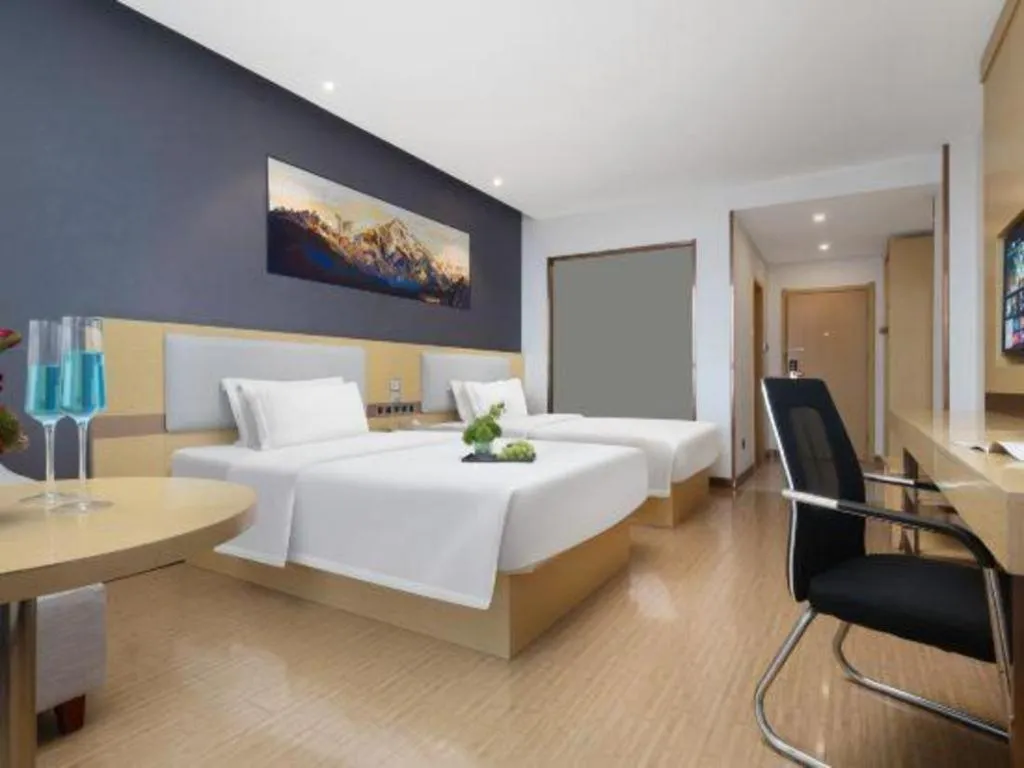 Bed in GreenTree Inn Huanggang City Wuxue City Kanjiang Avenue