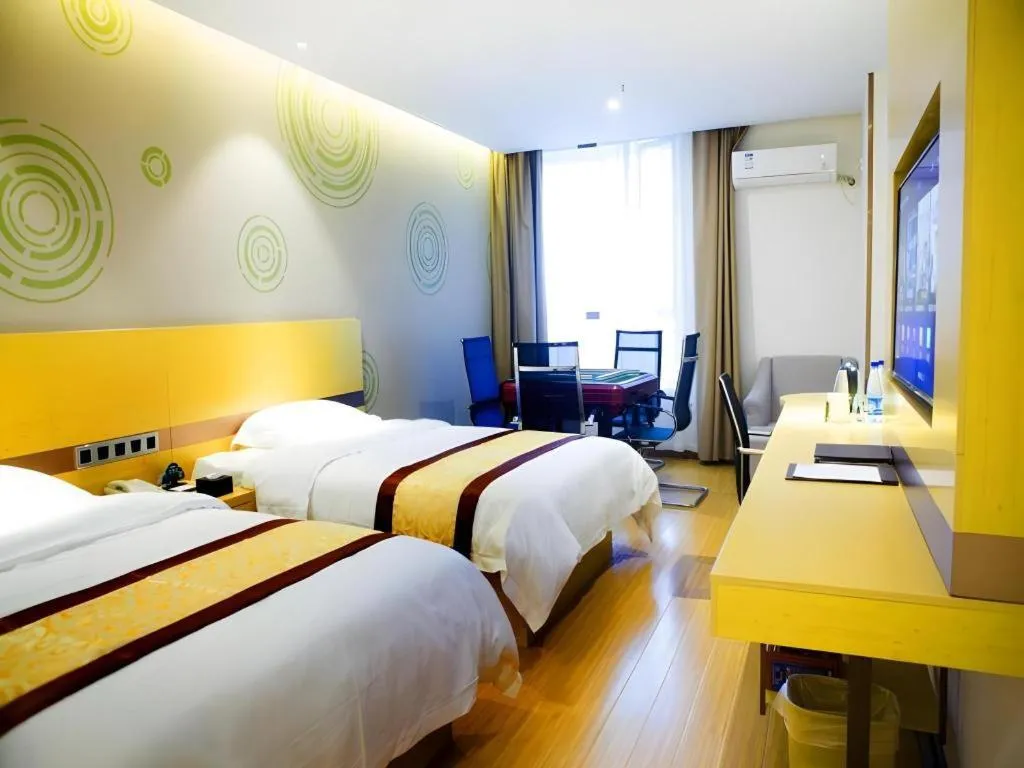 Bed in GreenTree Inn Huanggang City Wuxue City Kanjiang Avenue