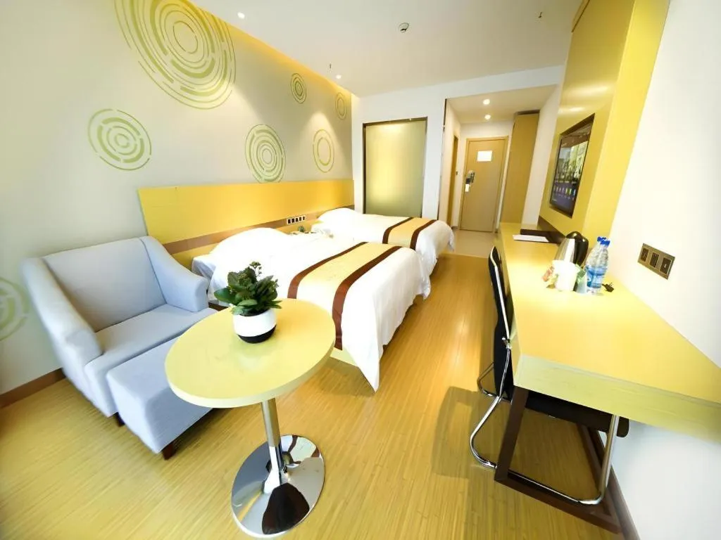 Bed in GreenTree Inn Huanggang City Wuxue City Kanjiang Avenue