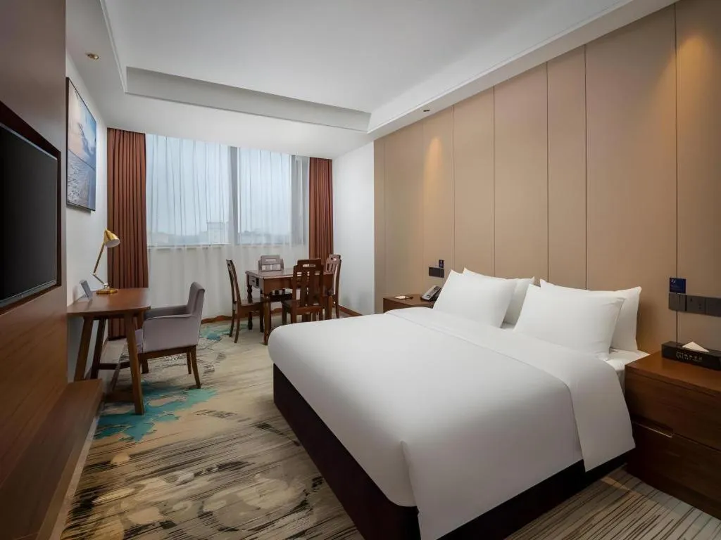 Bed in GME Taizhou Jingjiang City Bus Station Hotel