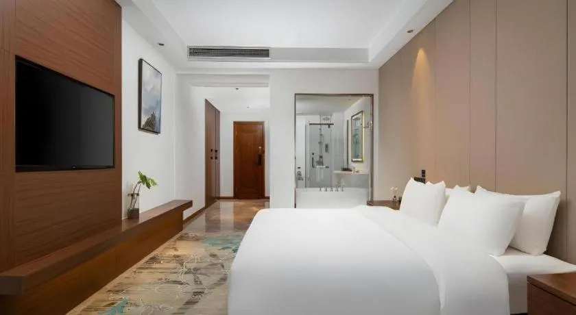 Bed in GME Taizhou Jingjiang City Bus Station Hotel