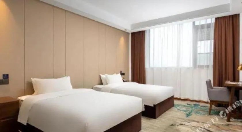 Bed in GME Taizhou Jingjiang City Bus Station Hotel