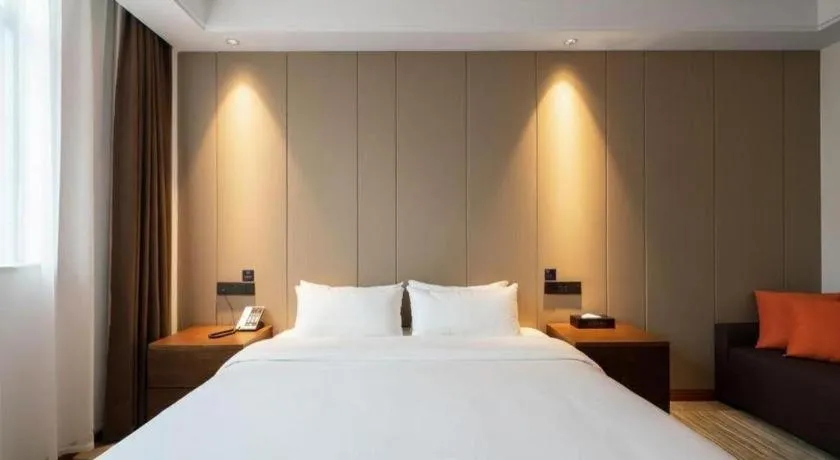 Bed in GME Taizhou Jingjiang City Bus Station Hotel