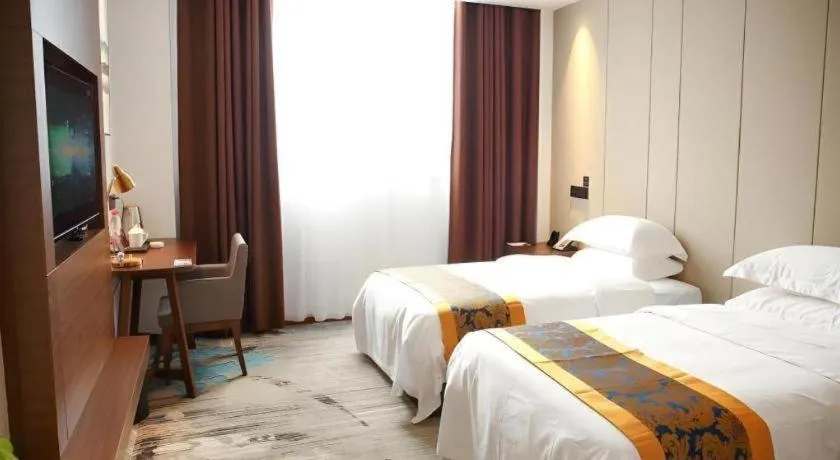 Bed in GME Taizhou Jingjiang City Bus Station Hotel