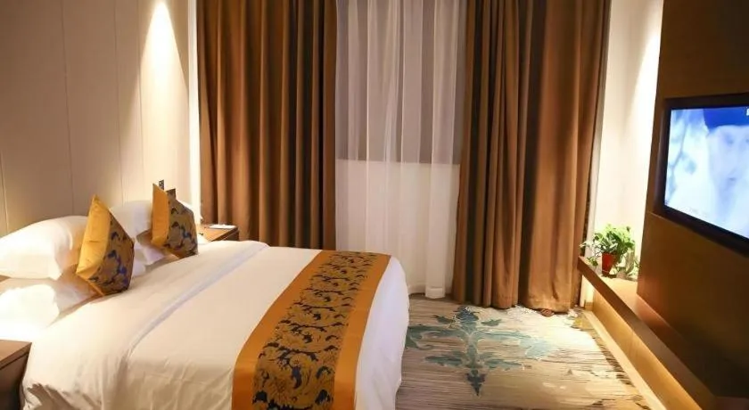 Bed in GME Taizhou Jingjiang City Bus Station Hotel