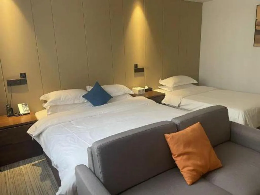 Bed in GME Taizhou Jingjiang City Bus Station Hotel