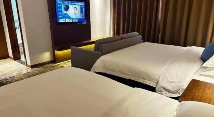 Bed in GME Taizhou Jingjiang City Bus Station Hotel