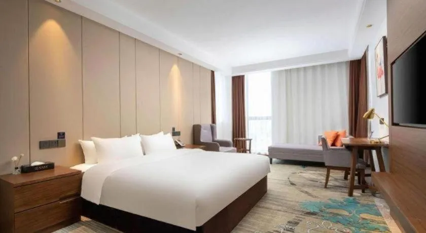 Bed in GME Taizhou Jingjiang City Bus Station Hotel