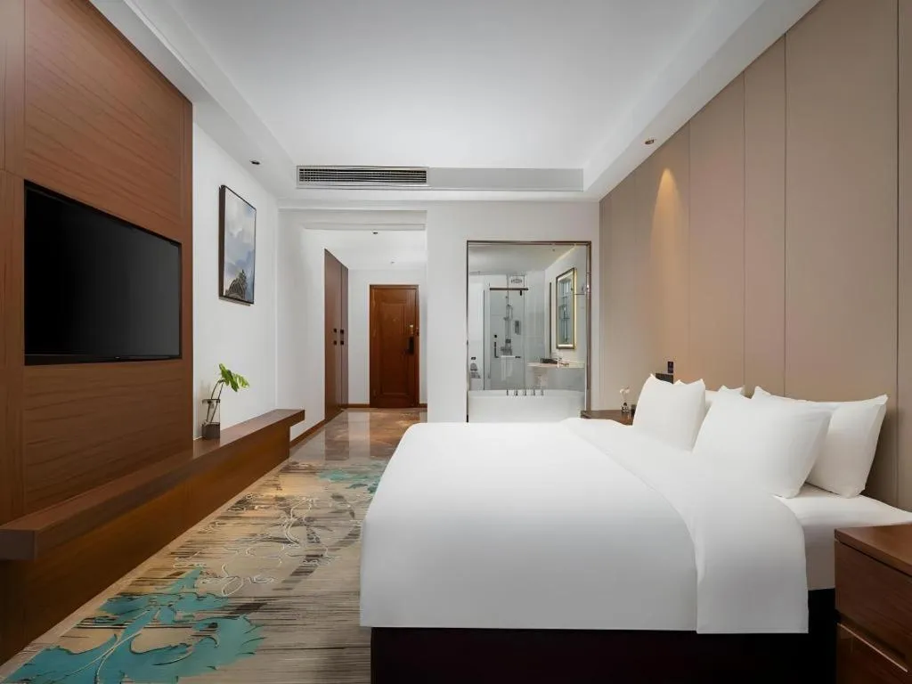 Bed in GME Taizhou Jingjiang City Bus Station Hotel