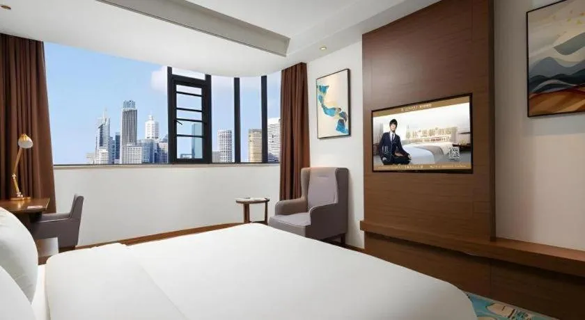 Bed in GME Taizhou Jingjiang City Bus Station Hotel