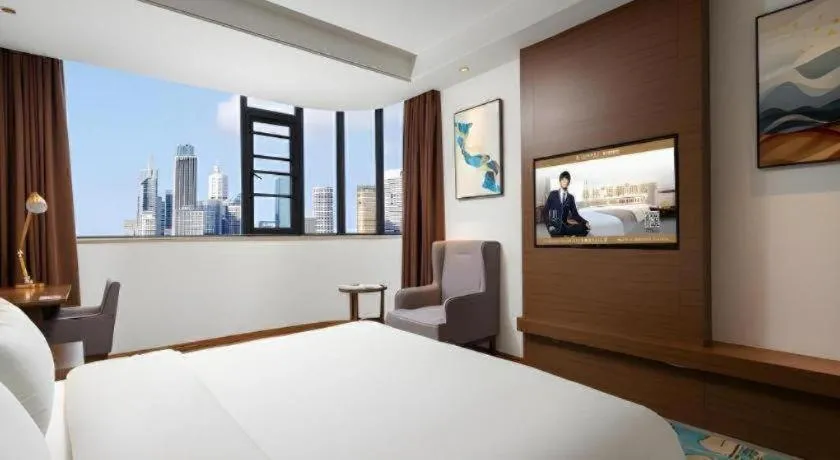 Bed in GME Taizhou Jingjiang City Bus Station Hotel