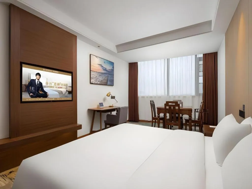 Bed in GME Taizhou Jingjiang City Bus Station Hotel