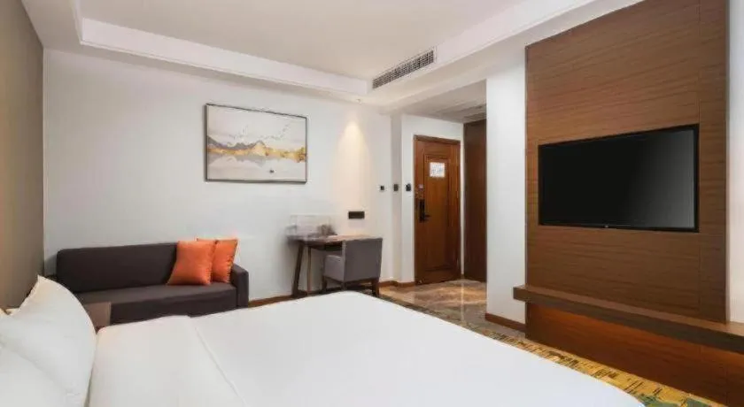 Bed in GME Taizhou Jingjiang City Bus Station Hotel