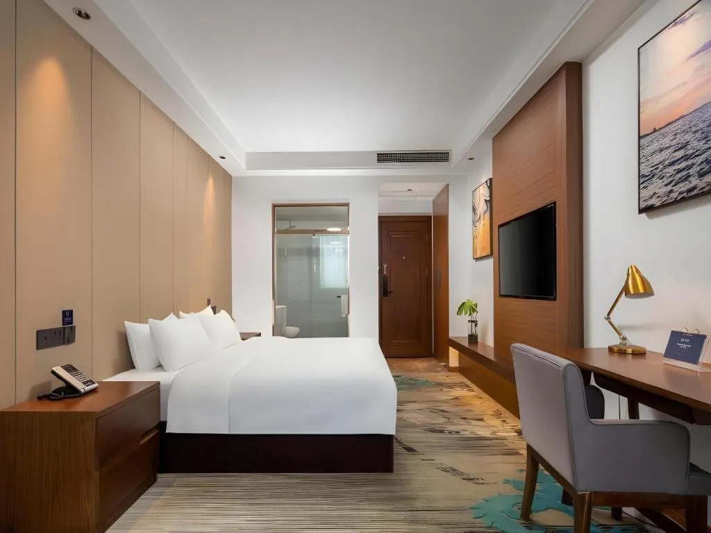 Bed in GME Taizhou Jingjiang City Bus Station Hotel