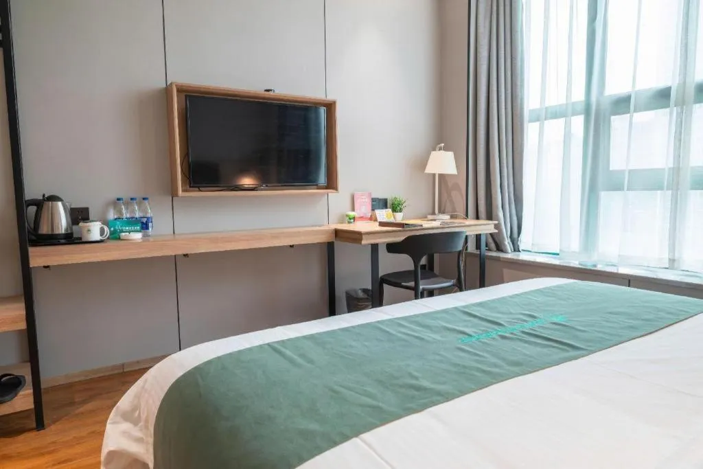 Bed in GreenTree Inn Wuxi Quanshan Center