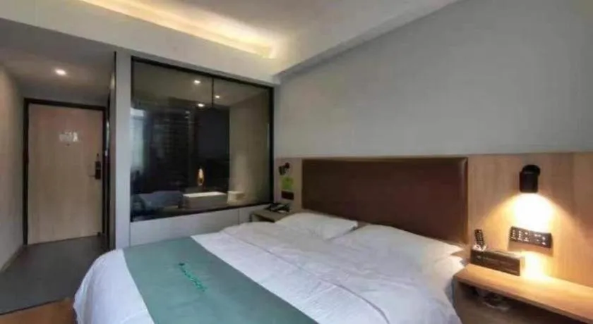 Bed in GreenTree Inn Wuxi Quanshan Center