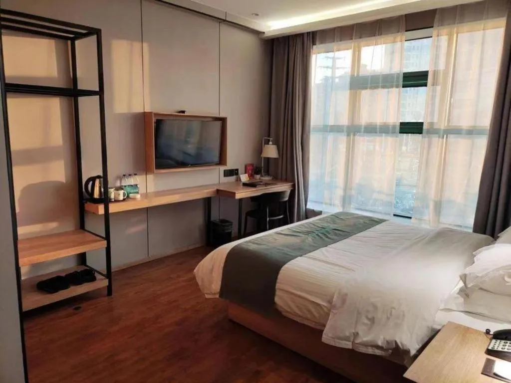 Bed in GreenTree Inn Wuxi Quanshan Center