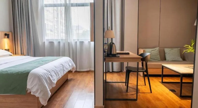 Bed in GreenTree Inn Wuxi Quanshan Center