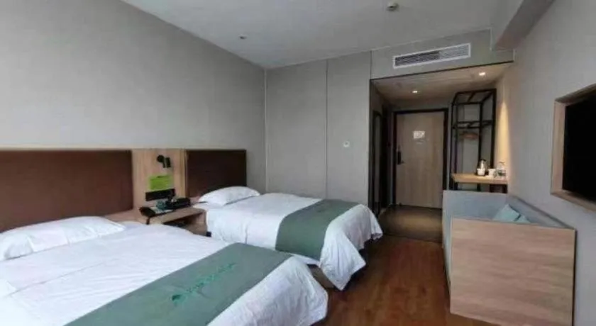 Bed in GreenTree Inn Wuxi Quanshan Center