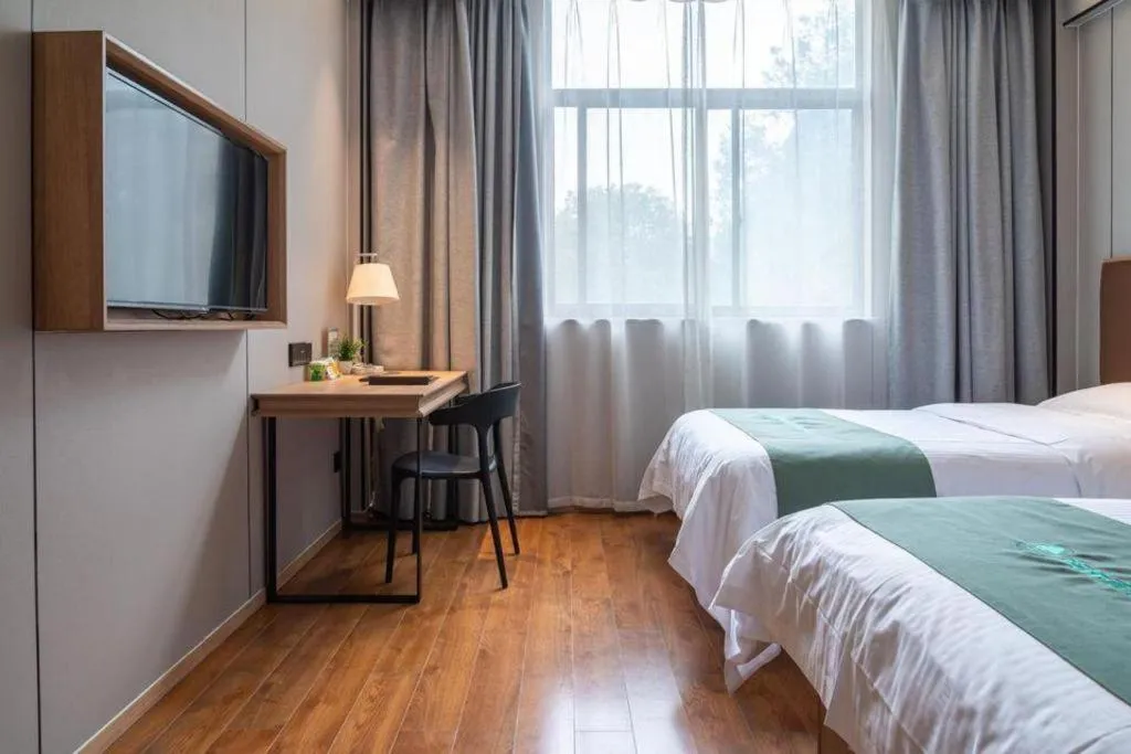 Bed in GreenTree Inn Wuxi Quanshan Center