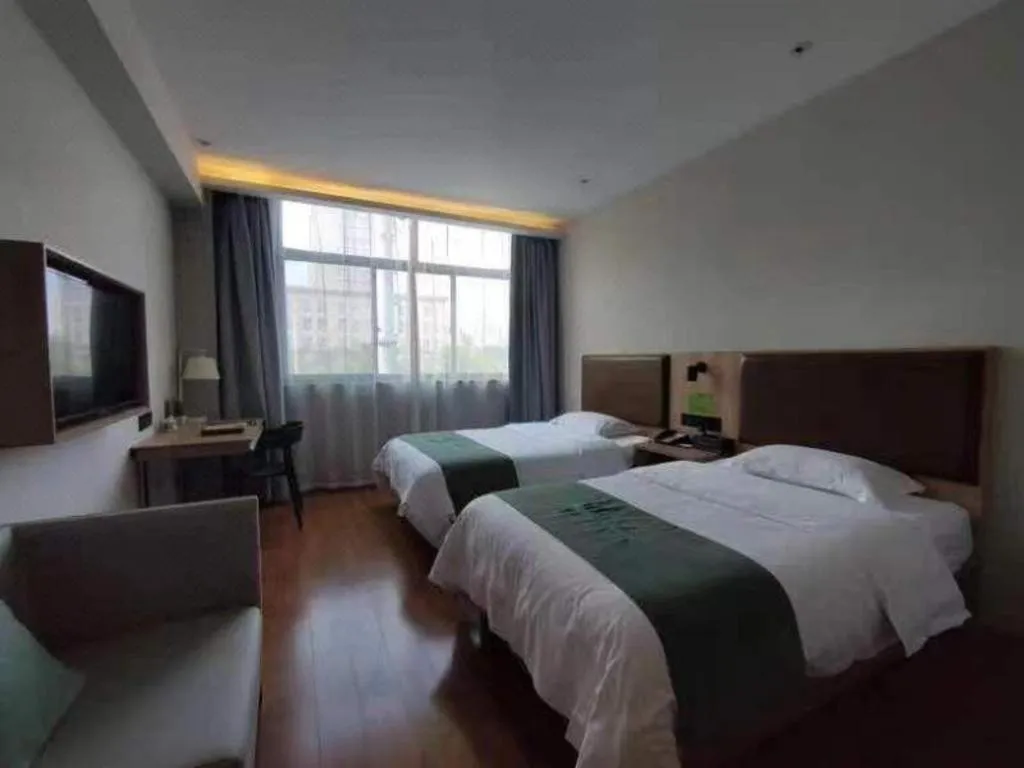 Bed in GreenTree Inn Wuxi Quanshan Center
