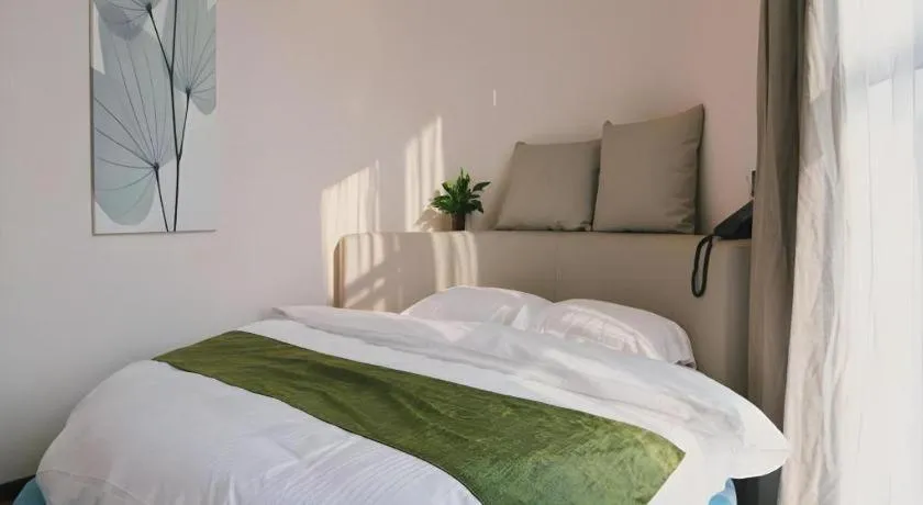 Bed in GreenTree Inn Nanjing Baijiahu