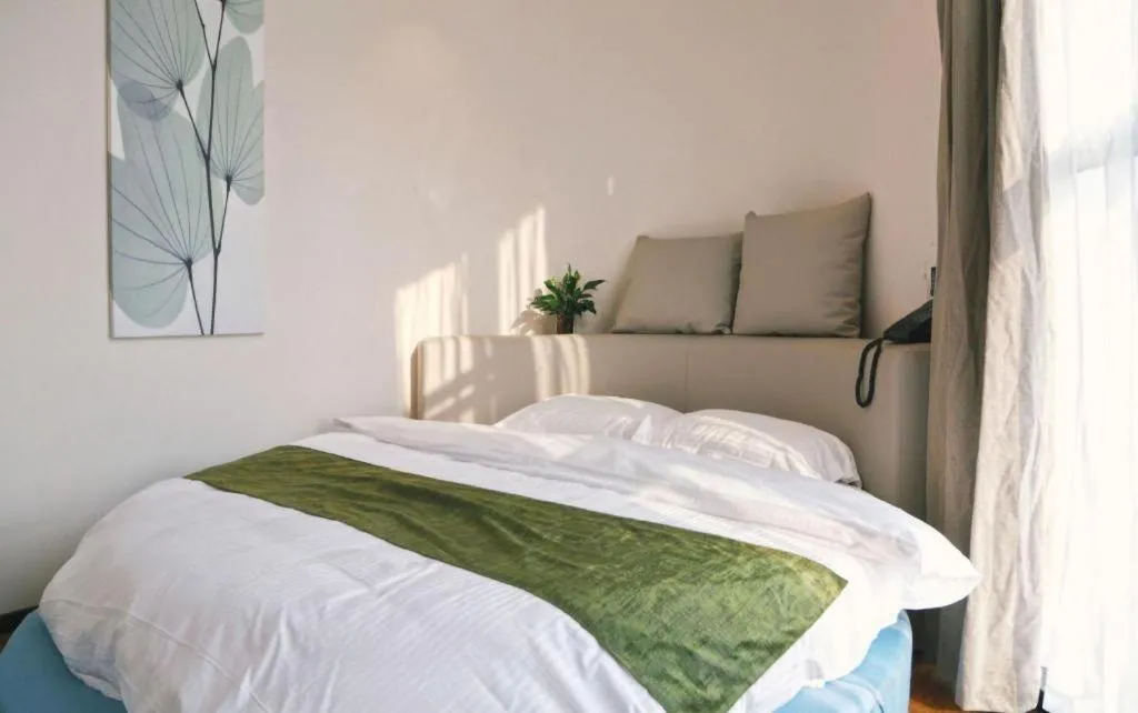 Bed in GreenTree Inn Nanjing Baijiahu