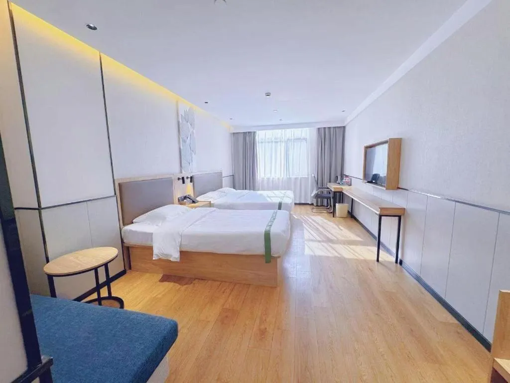 Bed in GreenTree Inn Nanjing Baijiahu