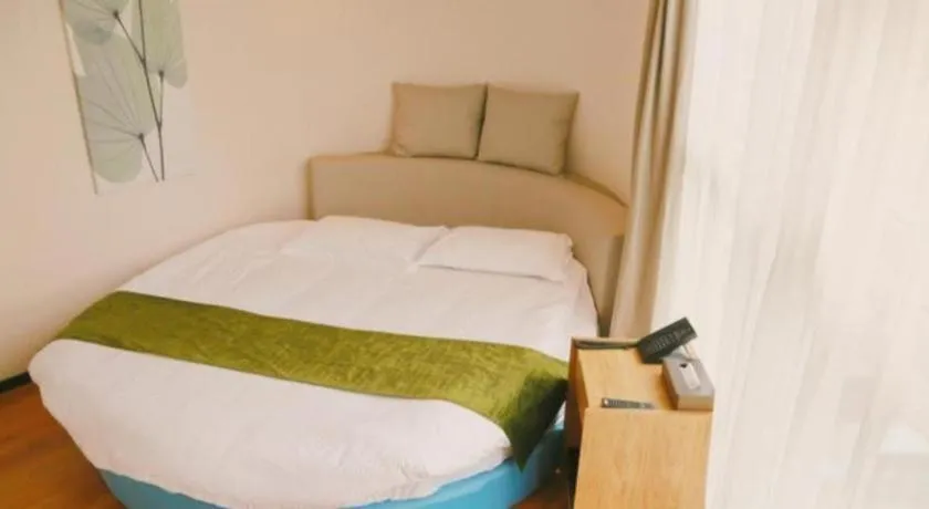 Bed in GreenTree Inn Nanjing Baijiahu