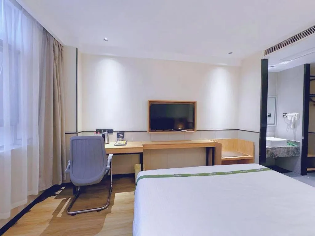 Bed in GreenTree Inn Nanjing Baijiahu