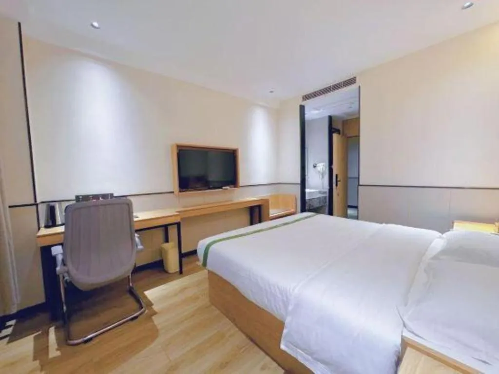 Bed in GreenTree Inn Nanjing Baijiahu