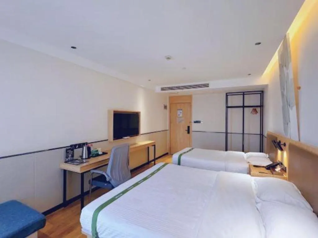 Bed in GreenTree Inn Nanjing Baijiahu