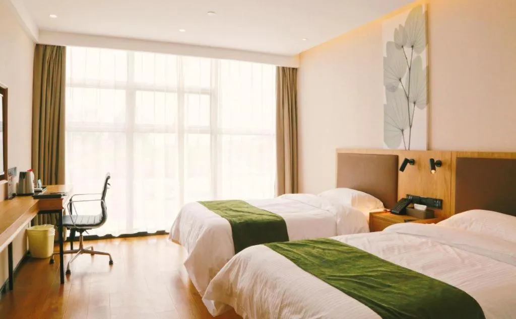 Bed in GreenTree Inn Nanjing Baijiahu