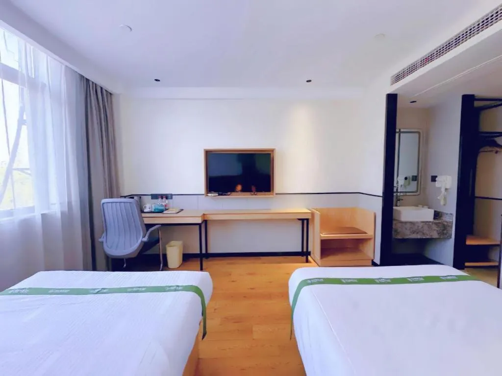 Bed in GreenTree Inn Nanjing Baijiahu