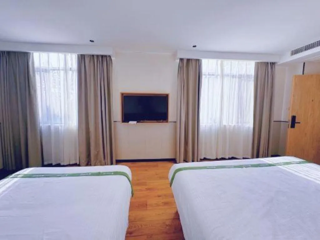 Bed in GreenTree Inn Nanjing Baijiahu