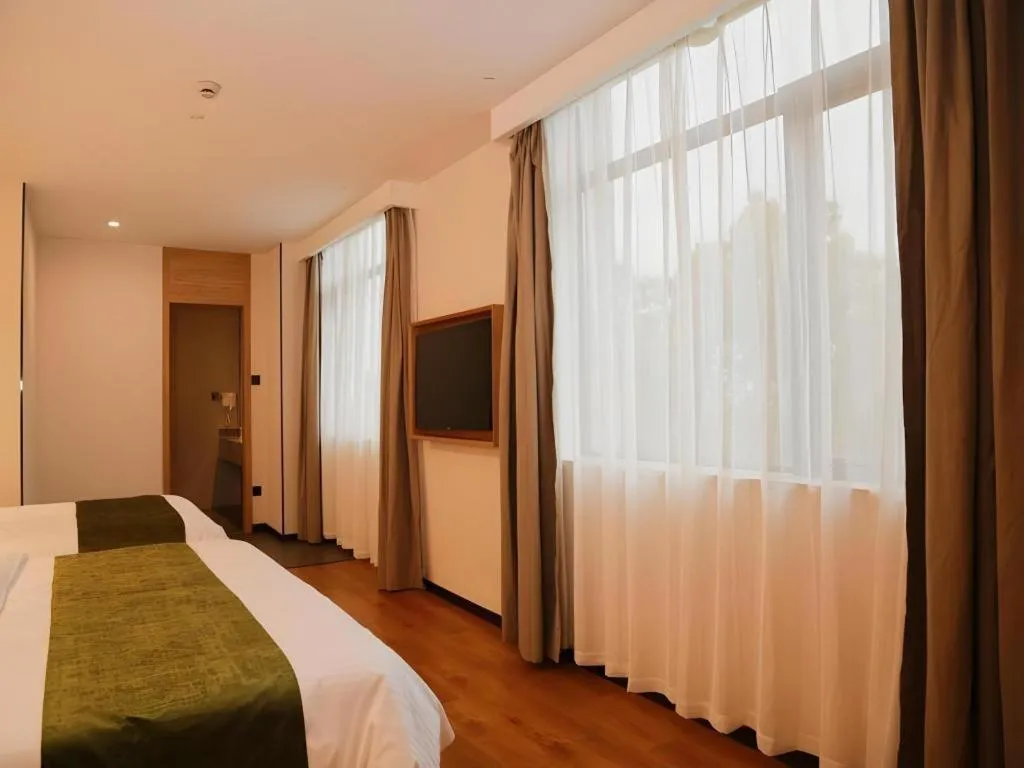 Bed in GreenTree Inn Nanjing Baijiahu