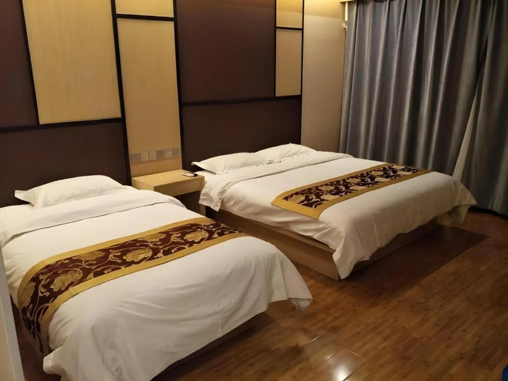 Bed in Shell Taiyuan South Station Shanxi University Hotel