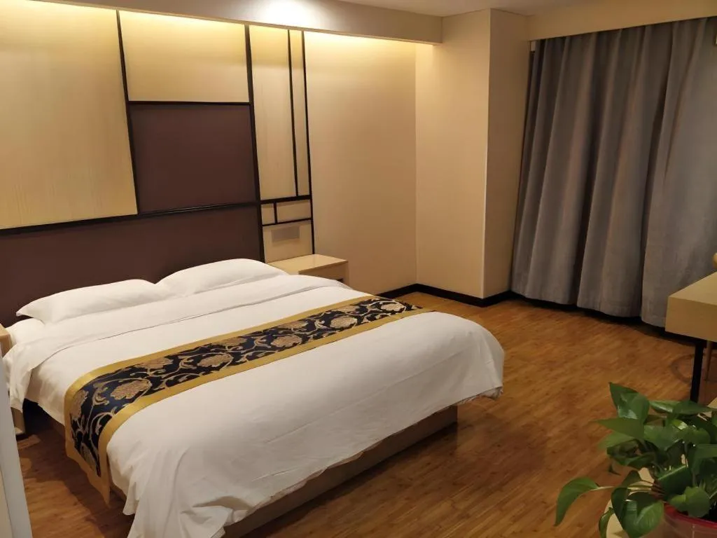 Bed in Shell Taiyuan South Station Shanxi University Hotel